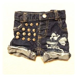Distressed denim shorts